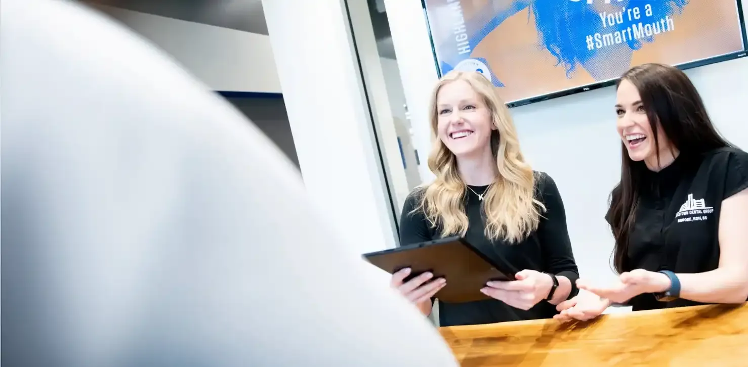 Team members at the Highland Row front desk